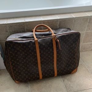 LOUIS VUITTON large travel bag. MONOGRAM SIRIUS 65